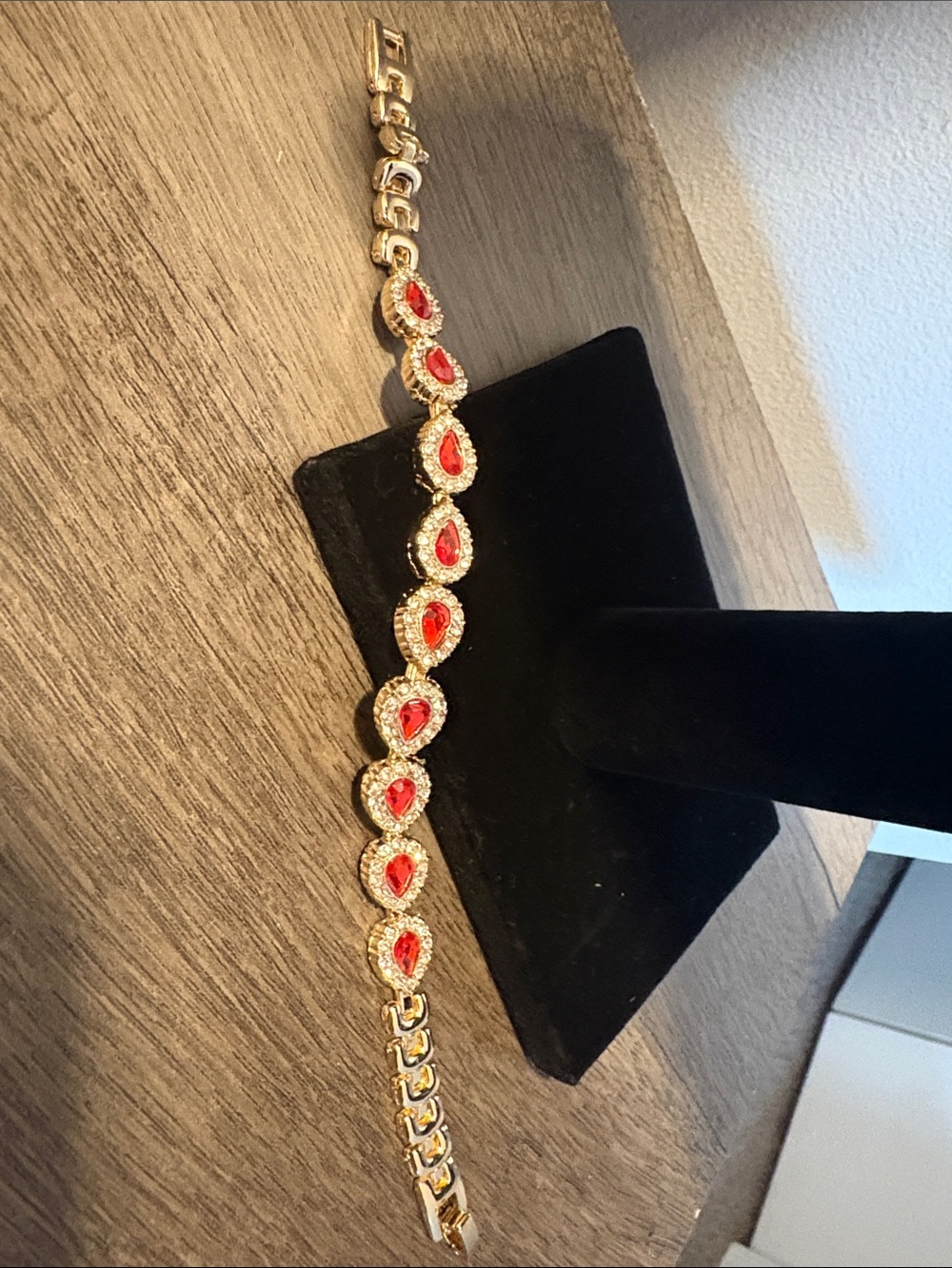 Gold Bracelet with Red Teardrop Stones - Elegant Women’s Jewelry